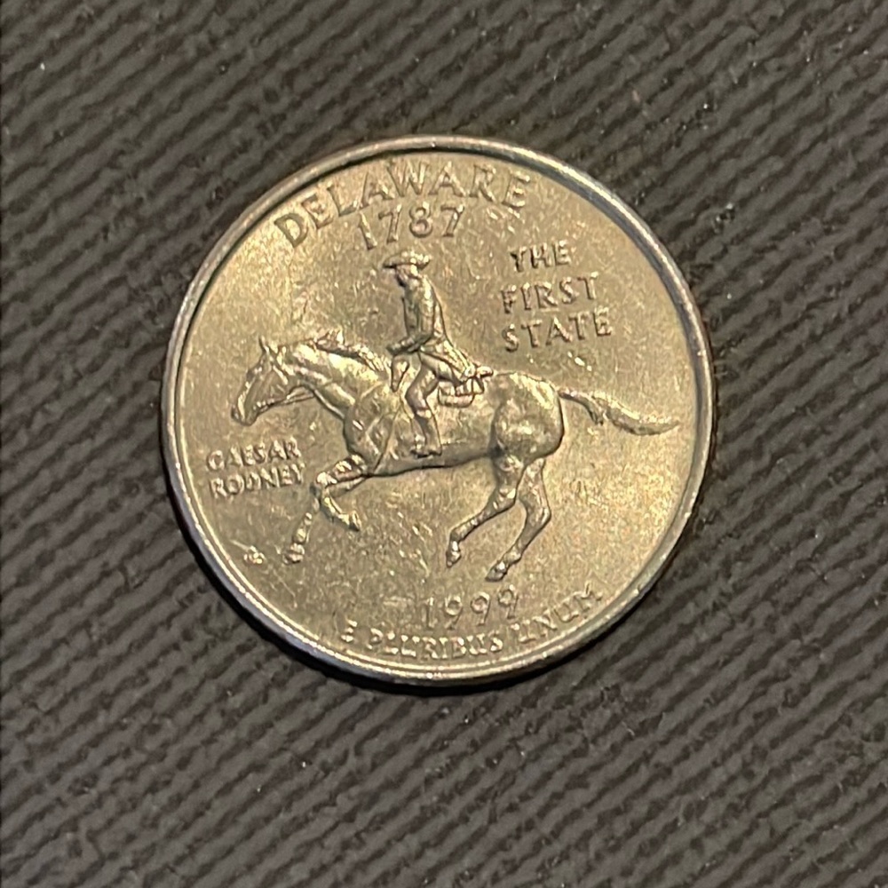 Quarter dollar coin 1999 Delaware state